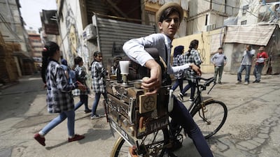 Mohammad Khaled Jahjah is south Beirut's dapper barber on a bike. All photos by Joseph Eid / AFP Photo