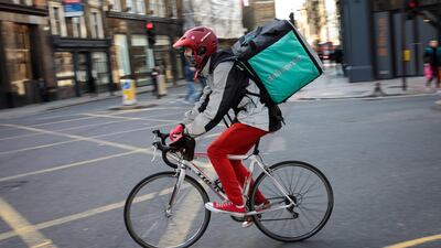 Delivery riders around the world are subject to cutomer expectations that food will be delivered piping hot and without delay. Getty Images