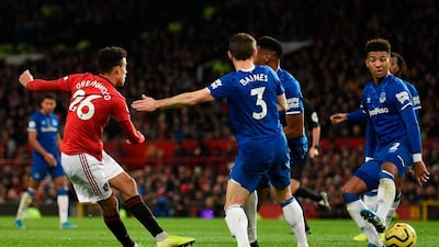 Manchester United striker Mason Greenwood scores their equaliser. AFP