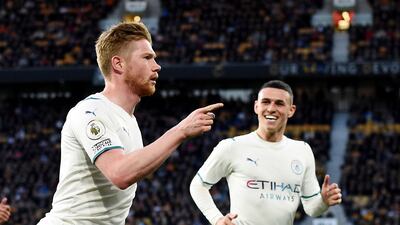 De Bruyne celebrates scoring City's third goal with Phil Foden. Reuters