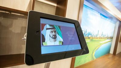 Sheikh Mohammed Bin Rashid, Vice President and Ruler of Dubai, can be seen on a screen within Emaar's exhibition at Harrods. Courtesy Emaar / Harrods Estates