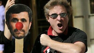 Members of the group, United Against Nuclear Iran, gather outside New York’s Warwick Hotel to protest against its guest, Iran’s president, Mahmoud Ahmadinejad, who is making his final appearance at the United Nations this week.