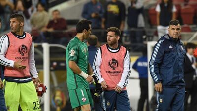 Chile's goalkeeper Claudio Bravo, in green, and Argentina's Lionel Messi chat at the end of their Copa America Centenario football tournament match in Santa Clara, California, United States, on June 6, 2016. AFP / Mark Ralston