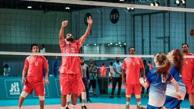 Volleyball match at Adnec. UAE vs USA. Mohammed Albloushi saves the ball.