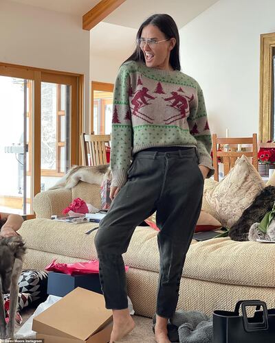 Demi Moore shared this image of herself wearing a festive jumper for New Year's Eve. Photo: Instagram