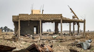 The house of local farmer Hamad al-Ibrahim is seen destroyed in the eastern Syrian village of Baghouz on March 13, 2020, a year after the fall of ISIS. AFP