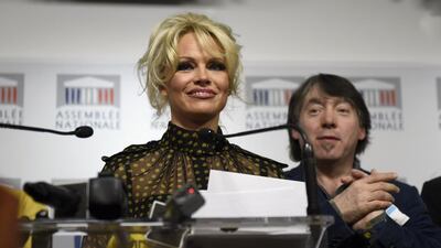 US actress Pamela Anderson gives a press conference after attending a session of questions to the Government at the French National Assembly in Paris on January 19, 2016. AFP