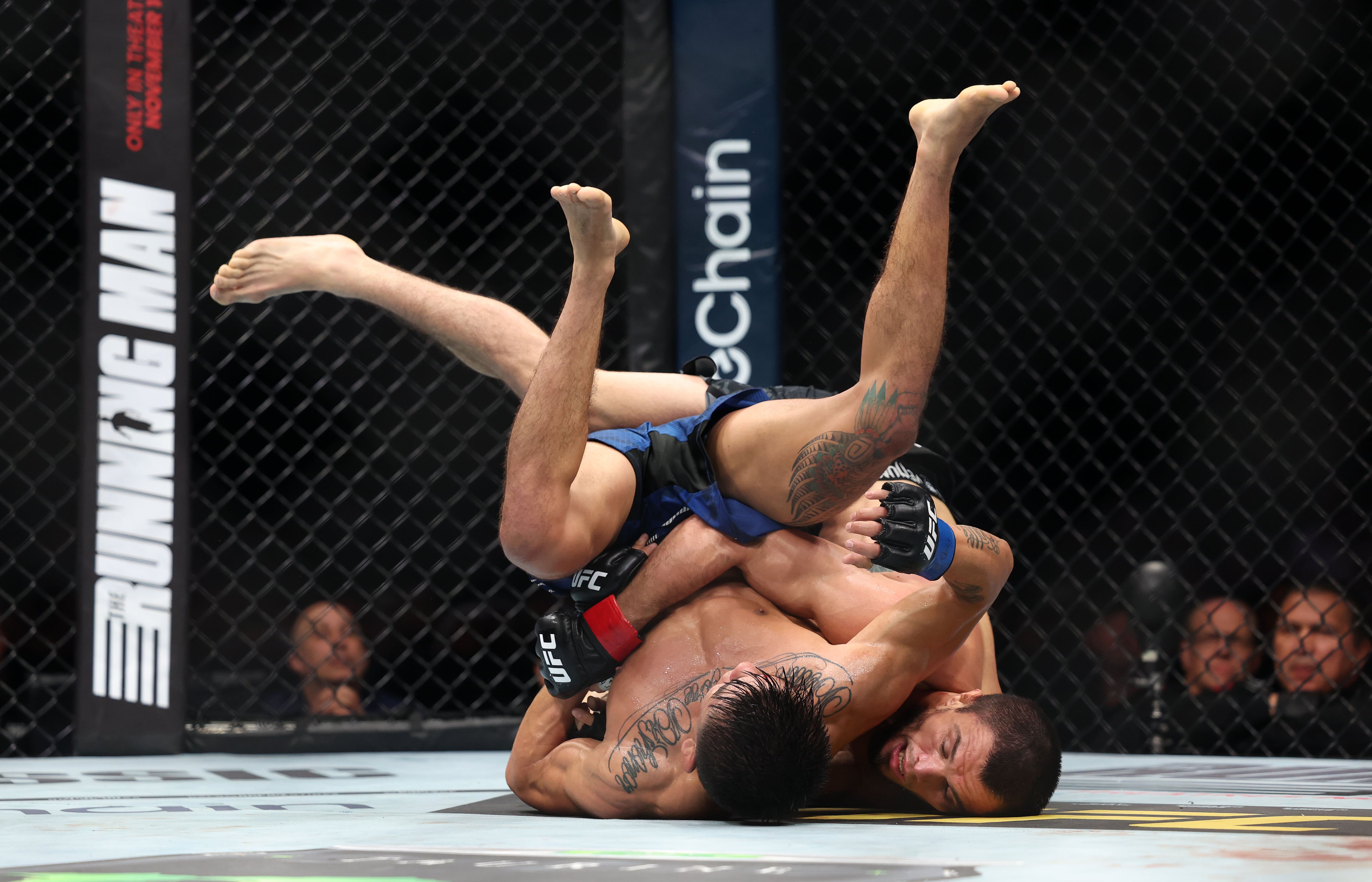 Umar Nurmagomedov (black shorts) beat Mario Bautista (blue shorts) by decision.