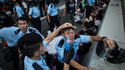Occupy had signalled that it would hold its protest on October 1, a holiday marking Chinese national day, before changing course when thousands took to the street to support the student-led demonstrations outside the main government building. Lam Yik Fei/Bloomberg