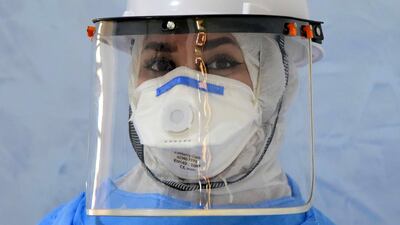 Nurse Fatima Abdul Nabi poses for a portrait at Baghdad Medical City. EPA