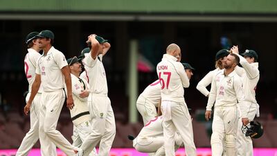 Australia players are stunned after after a DRS referral against India batsman Ajinkya Rahane was turned down. Getty