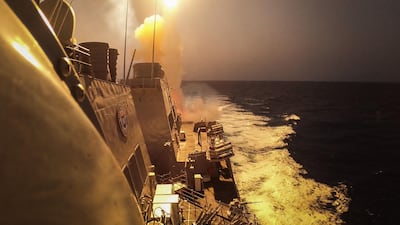 US guided-missile destroyer USS Carney fires at Houthi missiles and drones in the Red Sea. AFP