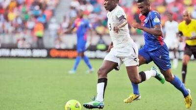 Asamoah Gyan, left, has so far been unable to enjoy a successful partnership up front for Ghana. Issouf Sanogo / AFP