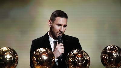 The Men's 2019 Ballon d'Or winner Barcelona forward Lionel Messi sits behind some of his six Ballon d'Or trophies during the ceremony at Theatre du Chatelet in Paris, France, 2 December 2019. EPA/YOAN VALAT