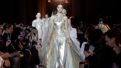 Molten silver looks at the Zuhair Murad Haute Couture spring 2023 show in Paris. Getty Images