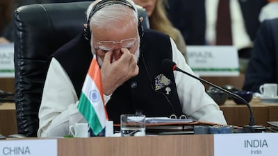 India's Prime Minister Narendra Modi gestures during Lula speech at the Brics summit. Getty Images