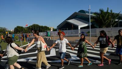 Indigenous people and activists take part in a demonstration in defense of the Amazon during the Cop30 UN Climate Summit, in Belem, Brazil, on November 6. AP