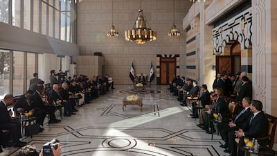 Syrian President Ahmad Al Shara with the UN delegation at the People's Palace in Damascus. EPA