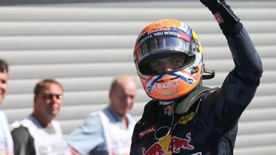 Red Bull driver Max Verstappen of the Netherlands raises his fist in the pit lane after the qualifying at the Belgian Formula One Grand Prix on Saturday. Olivier Matthys / AP