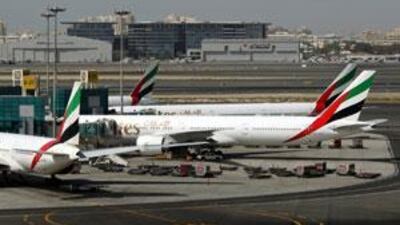 Emirates Airlines planes parked at Dubai international airport. Delays so far are believed to have cost the airline $66m.