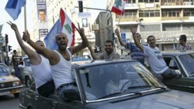 Lebanese supporters of Sunni Muslim politician Saad al Hariri, leader of the anti-Syrian alliance, celebrate in Tripoli June 8, 2009.
