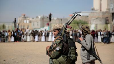 Armed Houthi fighters in Sanaa, Yemen. The Iran-backed group sentence six civilians to death last week on politicised charges. AP