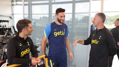 Hugo Lloris of Tottenham Hotspur with fitness coaches Stefano Bruno and Costantino Coratti. Getty Images
