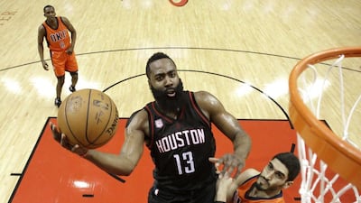 Houston Rockets' James Harden, left, goes up for a shot as Oklahoma City Thunder's Enes Kanter defends during the first half in Game 1 of the first-round playoff series, Sunday, April 16, 2017, in Houston. David J Phillip / AP Photo