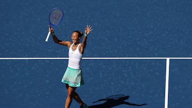 China's Qinwen Zheng celebrates defeating Poland's Iga Swiatek at the US Open. AFP