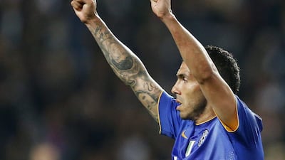 Carlos Tevez of Juventus celebrates advancing to the Champions League semi-finals after beating AS Monaco over two legs on Wednesday. Guillaume Horcajuelo / EPA / April 22, 2015