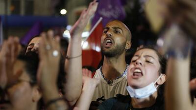 Palestinian protesters march during an anti-Israel demonstration over rising tension in Jerusalem, near the Jewish settlement of Beit El near Ramallah, in the occupied West Bank. AFP