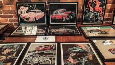A collection of motorcycle-themed art by Ukrainian artist Masha at 2020's Art of Motorcycles event