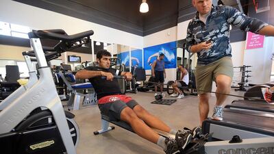 The du employee Saoud Al Mudharreb participates in a fitness challenge, which was a part of Wellness Programme at his office in Dubai. Satish Kumar / The National