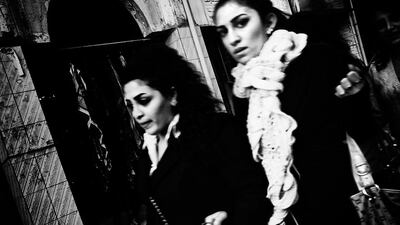 Young women walk in the market of Al Malikiyah, Derik. Under the control of the YPG (Peoples Protection Units) the town has a seizable Christian community that chose to remain despite the fact that the government withdrew the majority of its forces giving control to the Kurds.