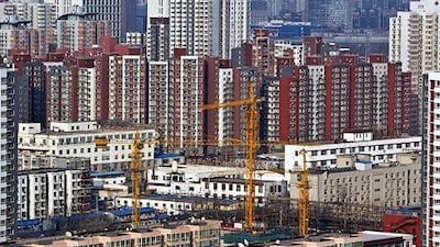 An aerial view of a housing area is seen on the outskirts of Beijing. A slow down in China would have a dramatic impact on the rest of the world. (AP Photo/Vincent Thian)