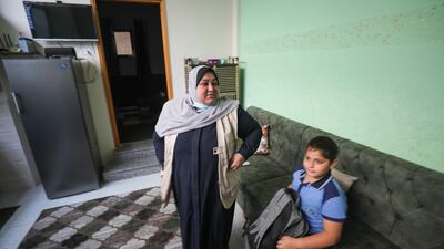 Um Mohammed has five children and works to support them. Photo by Majd Mahmoud