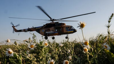 A helicopter takes off to carry out a mission during military drills in the north of Ukriane. Reuters