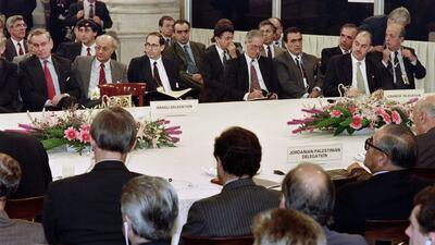 The Jordanian-Palestinian delegation (seen from back) faces the Israeli delegation. AFP