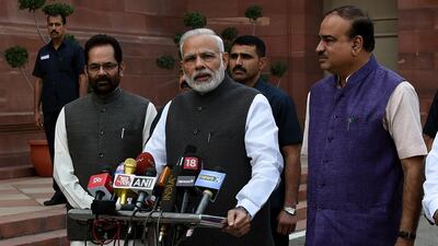 Indian prime minister Narendra Modi addresses the media after arriving for the winter session of Parliament in New Delhi. Money Sharma / AFP Photo