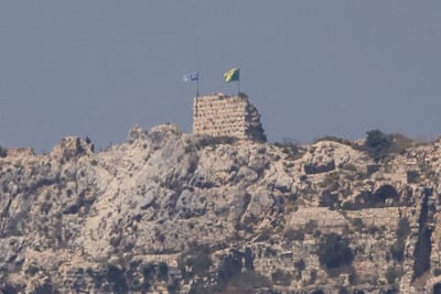 Israeli and Golani Brigade flags fly from the captured Beaufort Castle in southern Lebanon. AFP