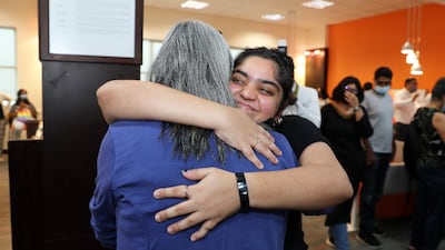 Drishtee Johar gets a hug from principal Ms Nargish Khambatta at Gems Modern Academy.