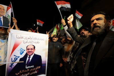 Supporters of former Iraqi prime minister Nouri Al Maliki protest against what they say is US interference in the country's sovereignty. Reuters