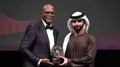 Samuel L Jackson receives the Lifetime Achievement award from Sheikh Mansoor bin Mohammed at the Opening Night Gala during day one of the 13th annual Dubai International Film Festival. Gareth Cattermole / Getty Images for DIFF