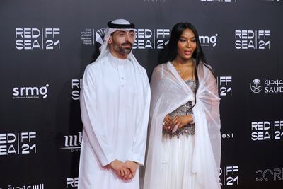 Red Sea International Film Festival chairman Mohammed Al Turki poses with British model Naomi Campbell during the closing ceremony in 2021. AP