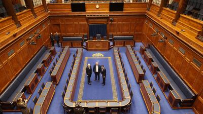Rishi Sunak tours the Assembly Chamber with Northern Ireland Assembly speaker Edwin Poots and Chris Heaton-Harris in Stormont. AFP