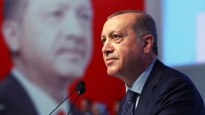 Turkey's president Recep Tayyip Erdogan talks to supporters in Istanbul on August 20, 2017. Presidency Press Service via AP, Pool