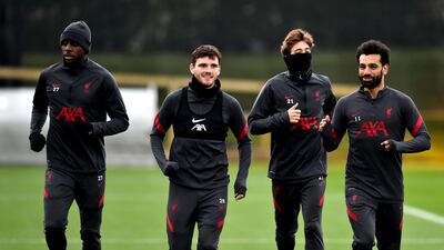 Divock Origi, Andy Robertson, Kostas Tsimikas and Mohamed Salah during Liverpool's training session in Kirkby. Getty