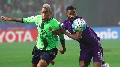 Jeonbuk Hyundai Motors, green, hold a 2-1 lead following victory in the first leg of the Asian Champions League final. Yonhap / AFP