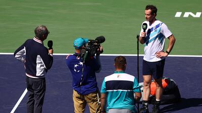 Andy Murray of Great Britain is interviewed for TV after winning his 700th tour victory against Taro Daniel of Japan. AFP