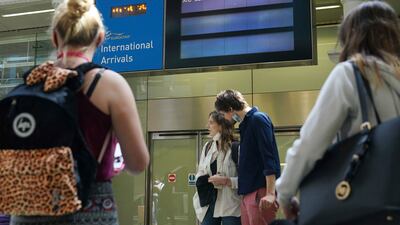 Travellers arrive from France on the Eurostar train at St Pancras International railway station in London. AP